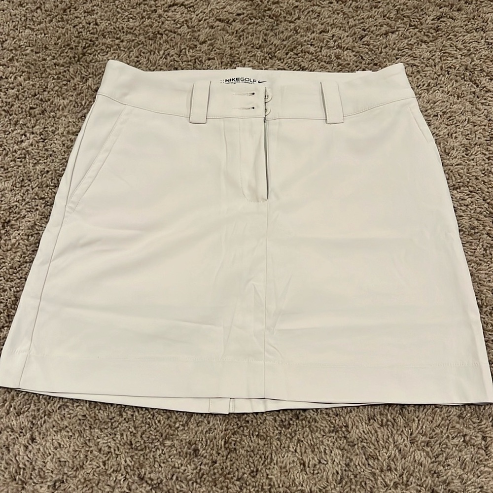 Women's Nike Dri-fit Golf skirt with built in shorts.